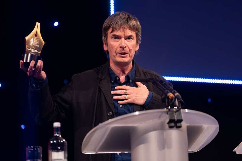 Ian Rankin accepts the award for Book of the Year - Fiction: Crime & Thriller for his work on The Dark Remains